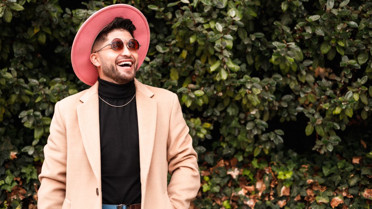 Happy Fashionable Gay Man Outdoors. Mens spring style